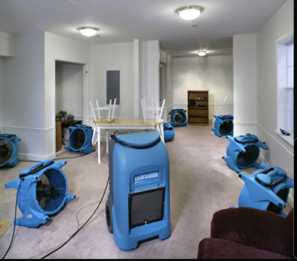 Air movers and dehumidifier setup for Water Damage Restoration in Bellbrook